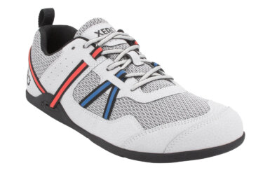 Prio Men's Lunar Athletic Shoe a white body with a black sole and red and blue huarache strap accents right front view